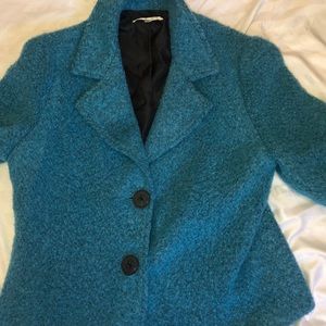 Button up blue jacket.